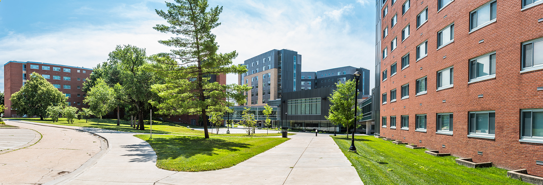 Exterior of three residence halls and green space on K-State's Manhattan campus
