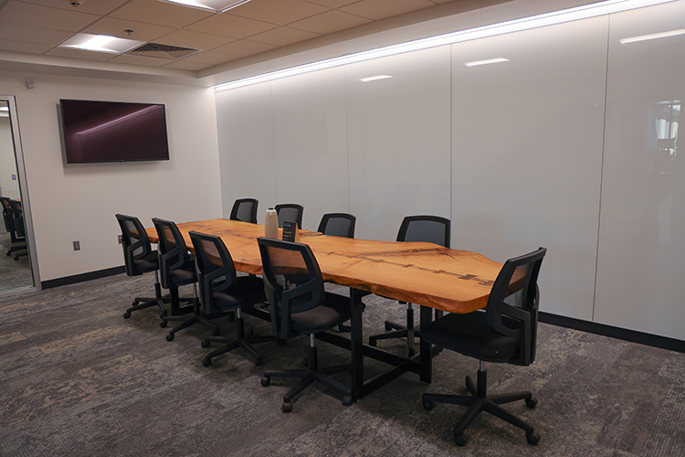 Chairs grouped around a conference table.